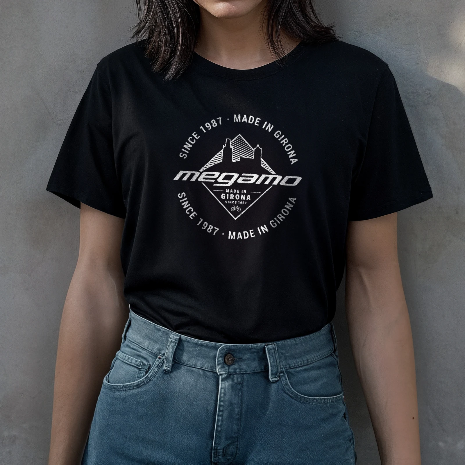 Black Megamo T-shirt with a white Made in Girona chest graphic