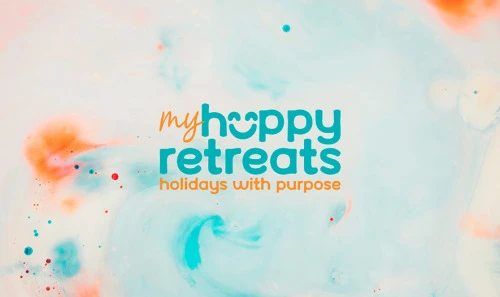 My Happy Retreats turquoise and orange wordmark